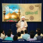طرح بنر و کتیبه ولادت امام رضا (ع) زمینه کرم تذهیب با گنبد طلایی و متن ولادت امام رضا مبارک 8040