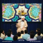 طرح بنر و کتیبه ولادت امام رضا (ع) زمینه فیروزه‌ای اسلیمی و تذهیب با کتیبه ولادت امام رضا 8051